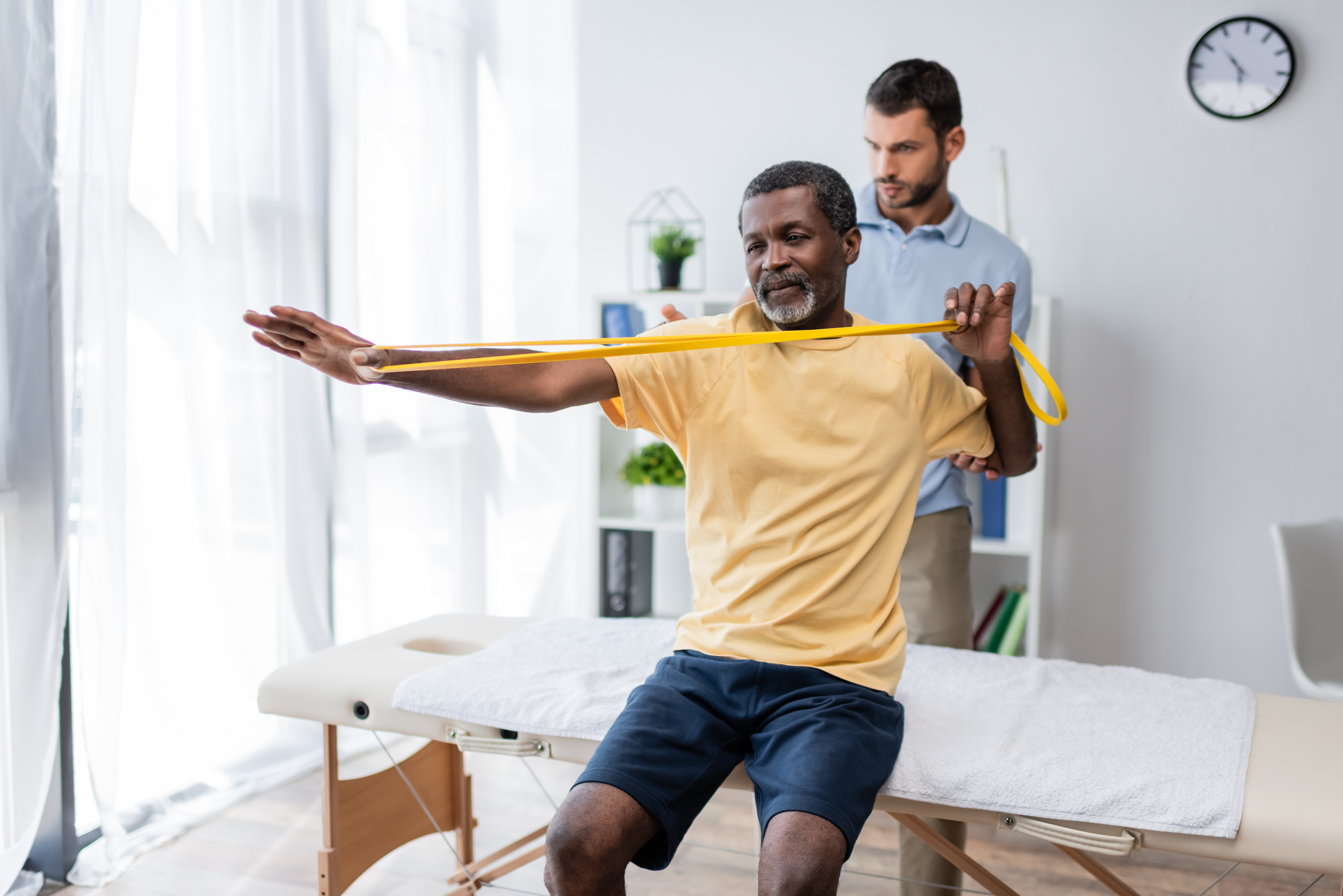 Middle Aged Man with Mobility Strength Bands Middle Aged Man with Mobility Strength Bands